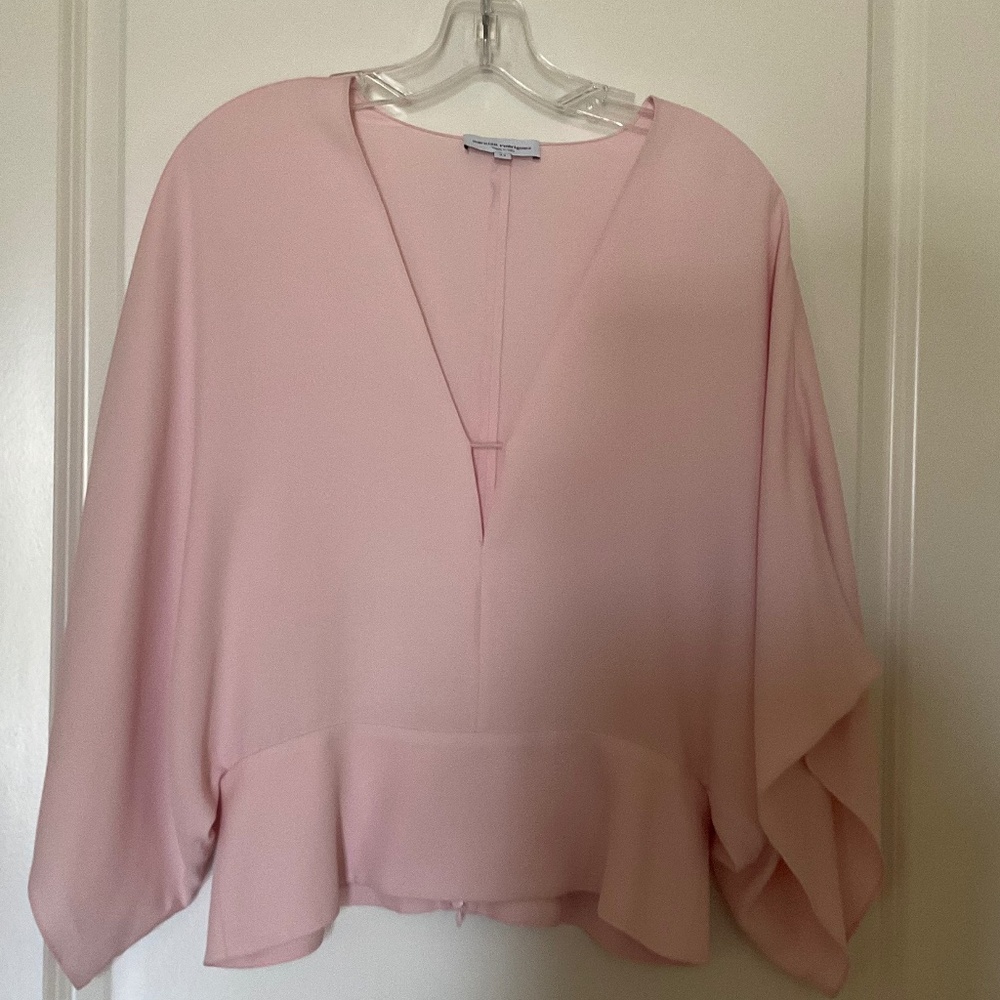 Silk blouse.with butterfly sleeves.